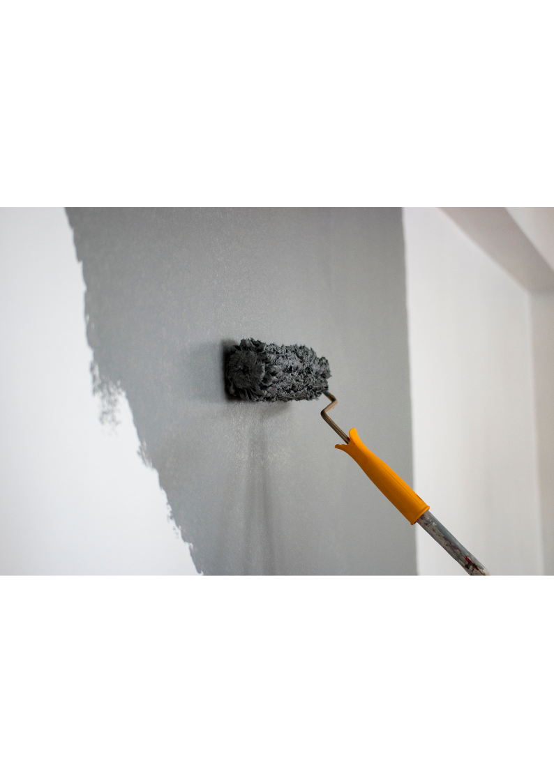 Painting Wall With Gray Paint Roller Painting FRP panel with a gray roller, showing progress.