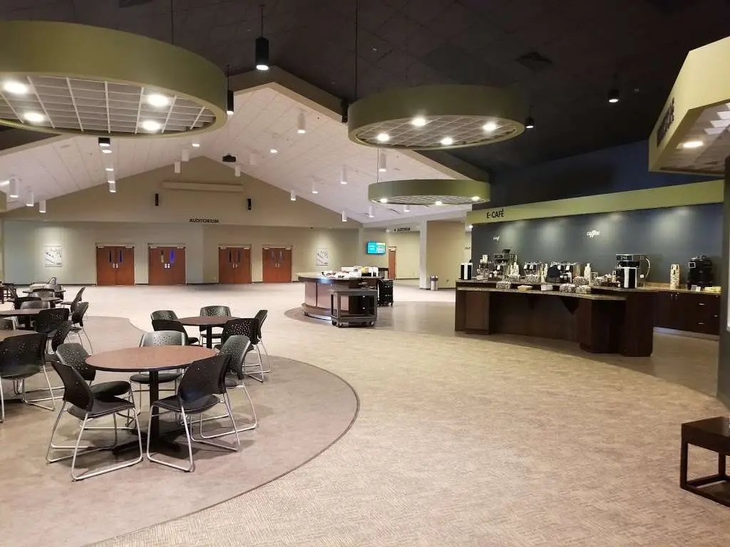 Modern church lobby with E-Cafe and Auditorium entrance.