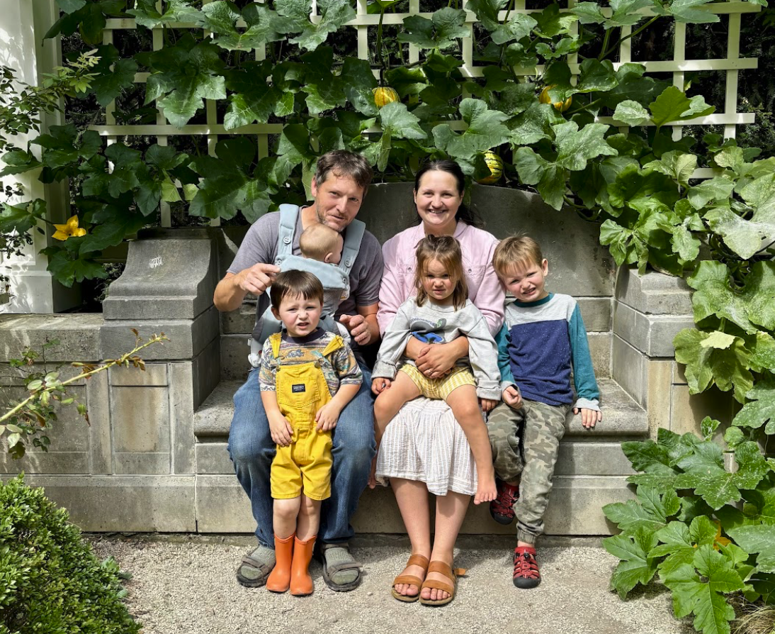 James Sands family portrait: parents with four young children outdoors
