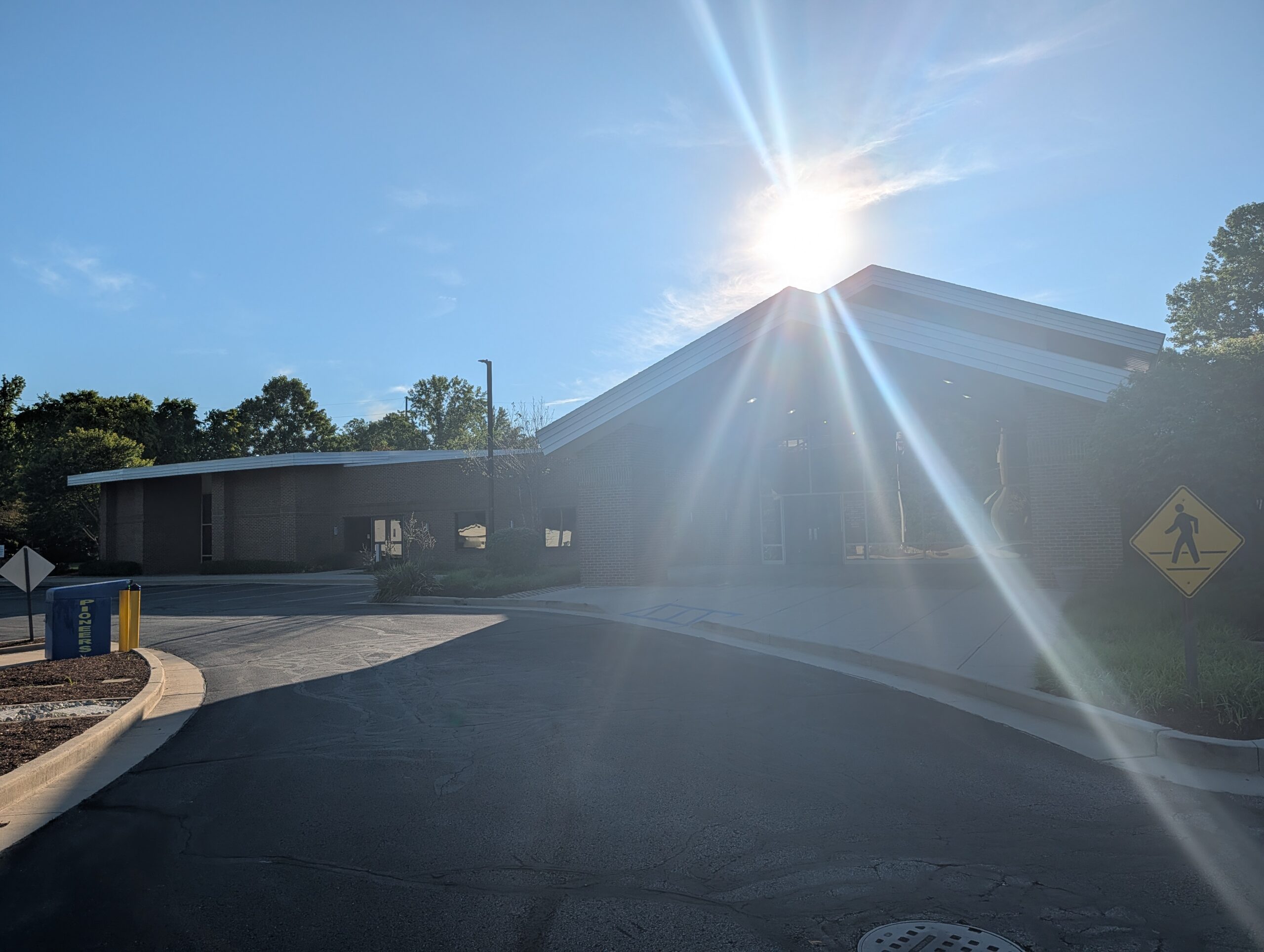 Brick Building Entrance Sunlight Glare Mooresville Public Library - Exterior Cleaning
