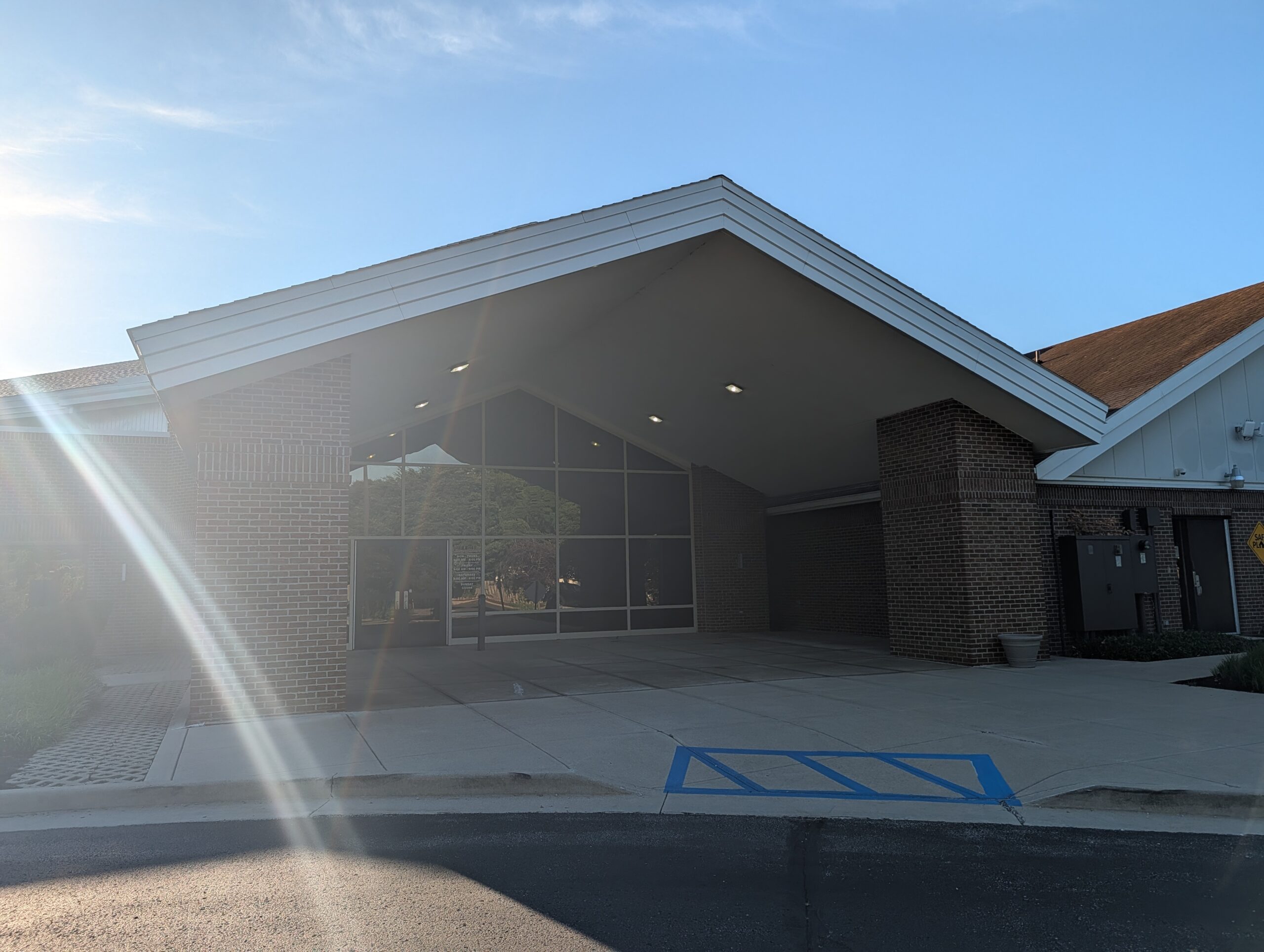 Brick Building Entrance With Glass Windows Mooresville Public Library - Exterior Cleaning