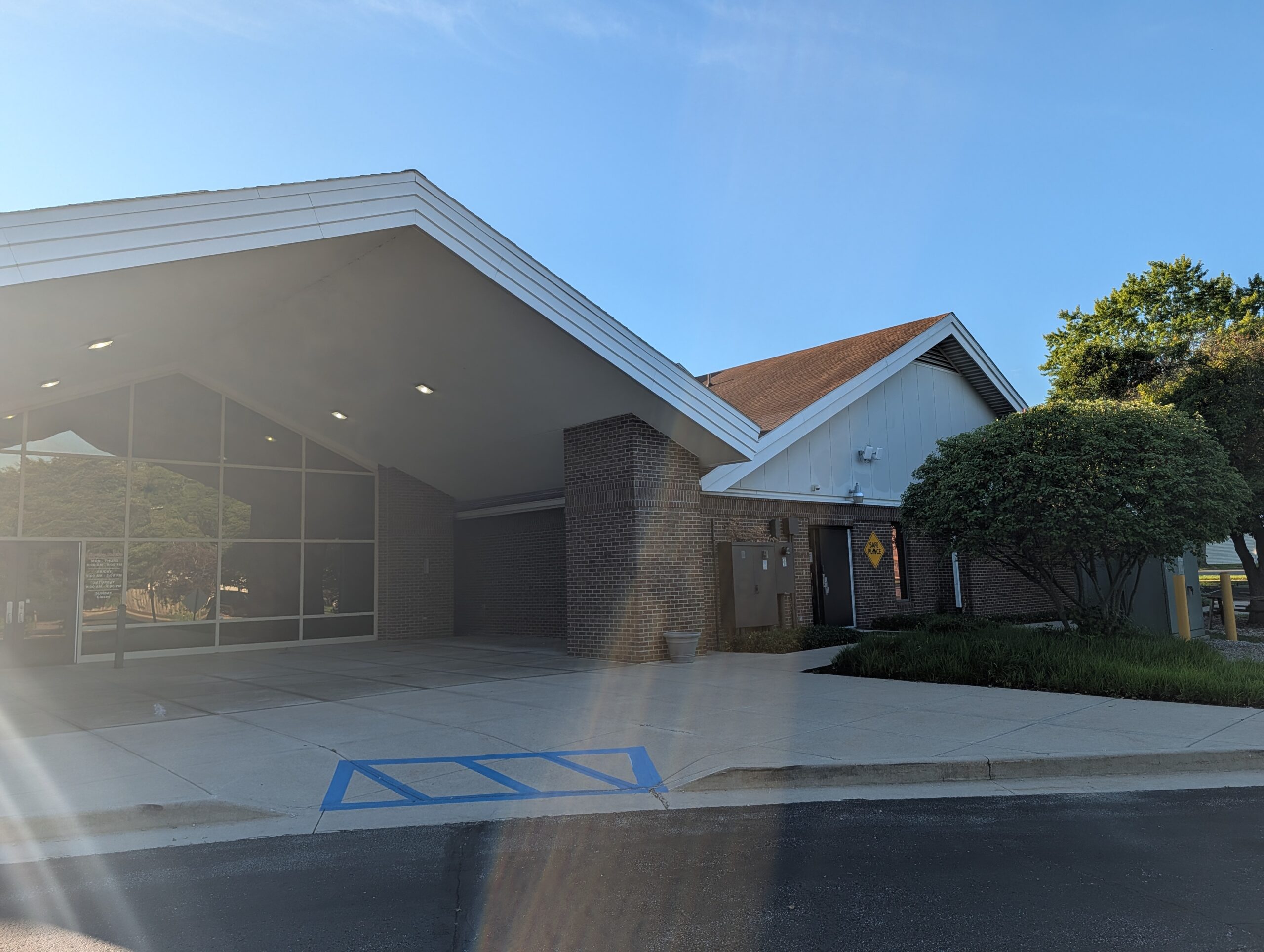 Brick Building Entrance With Large Window Mooresville Public Library - Exterior Cleaning