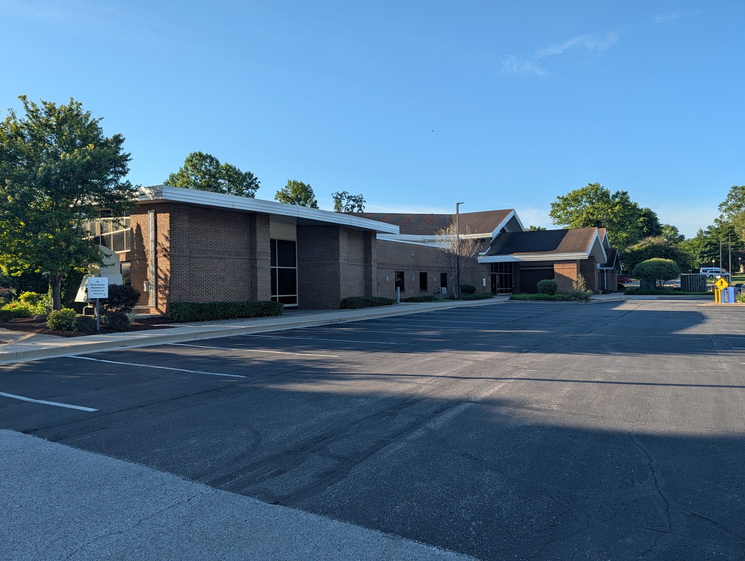 Brick Building Parking Lot Sunny Day Mooresville Public Library - Exterior Cleaning