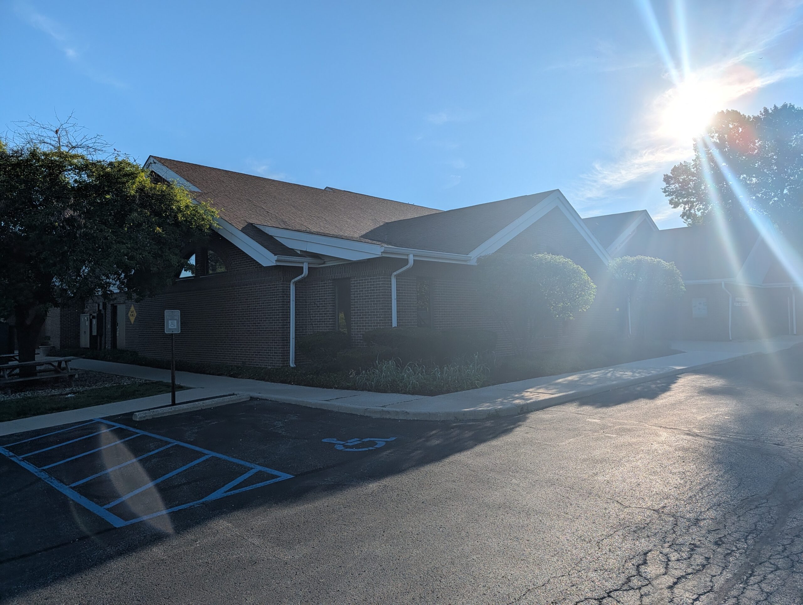 Brick Building With Parking Lot And Sunlight Mooresville Public Library - Exterior Cleaning