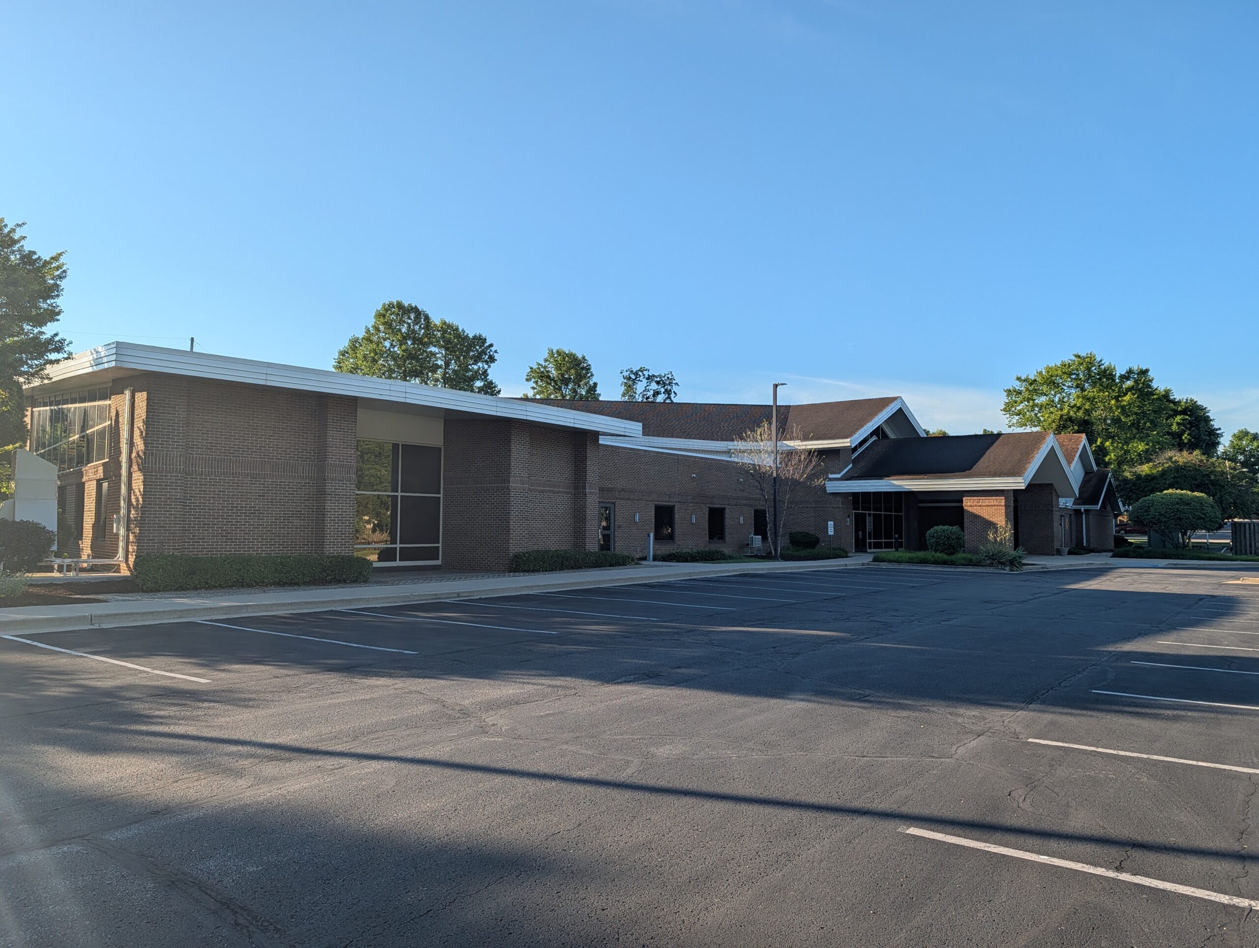 Brick Office Building With Parking Lot Mooresville Public Library - Exterior Cleaning