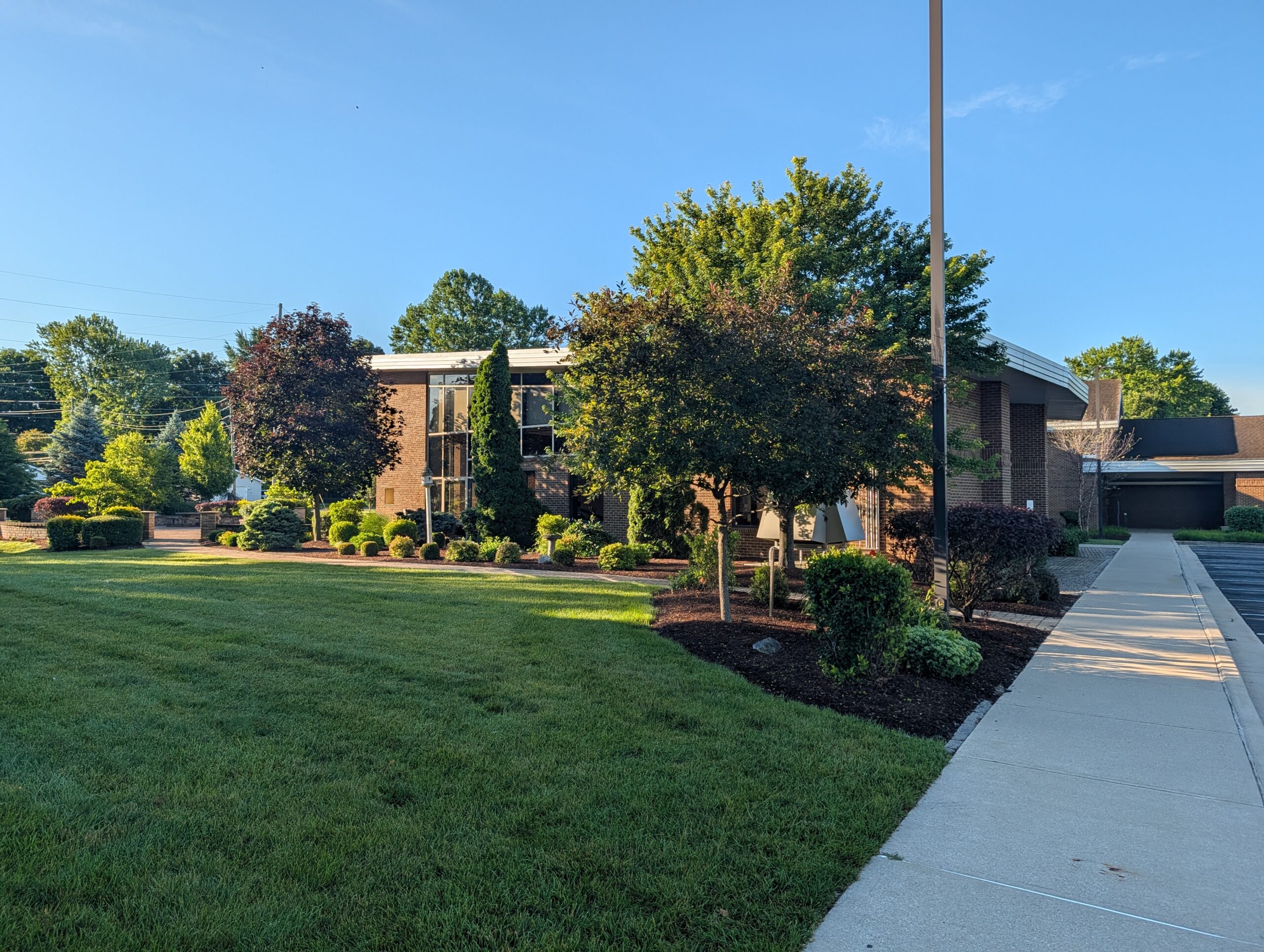 Modern Brick Building Landscaped Lawn Mooresville Public Library - Exterior Cleaning