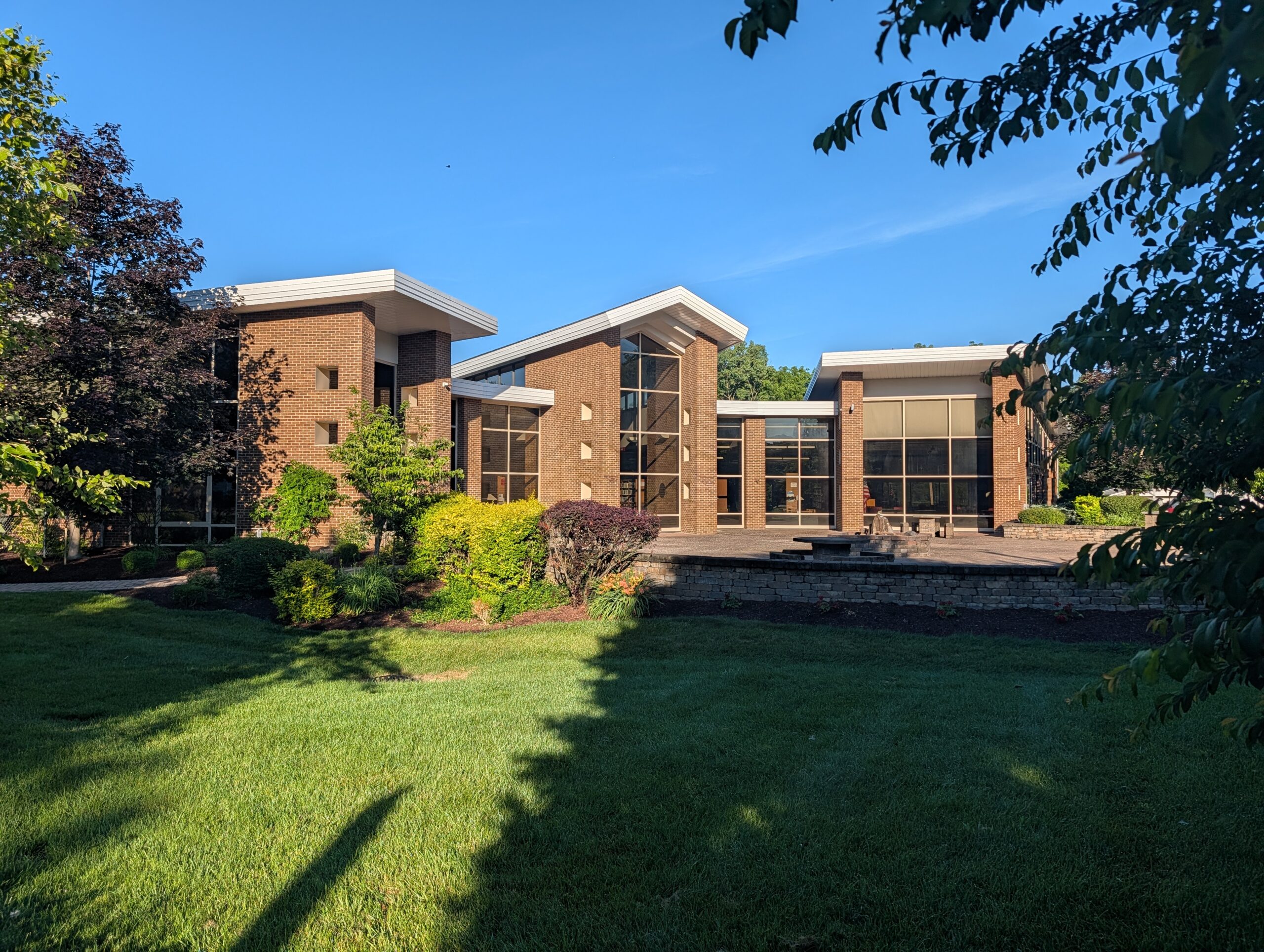 Modern Brick Building With Glass Windows And Landscaping Mooresville Public Library - Exterior Cleaning