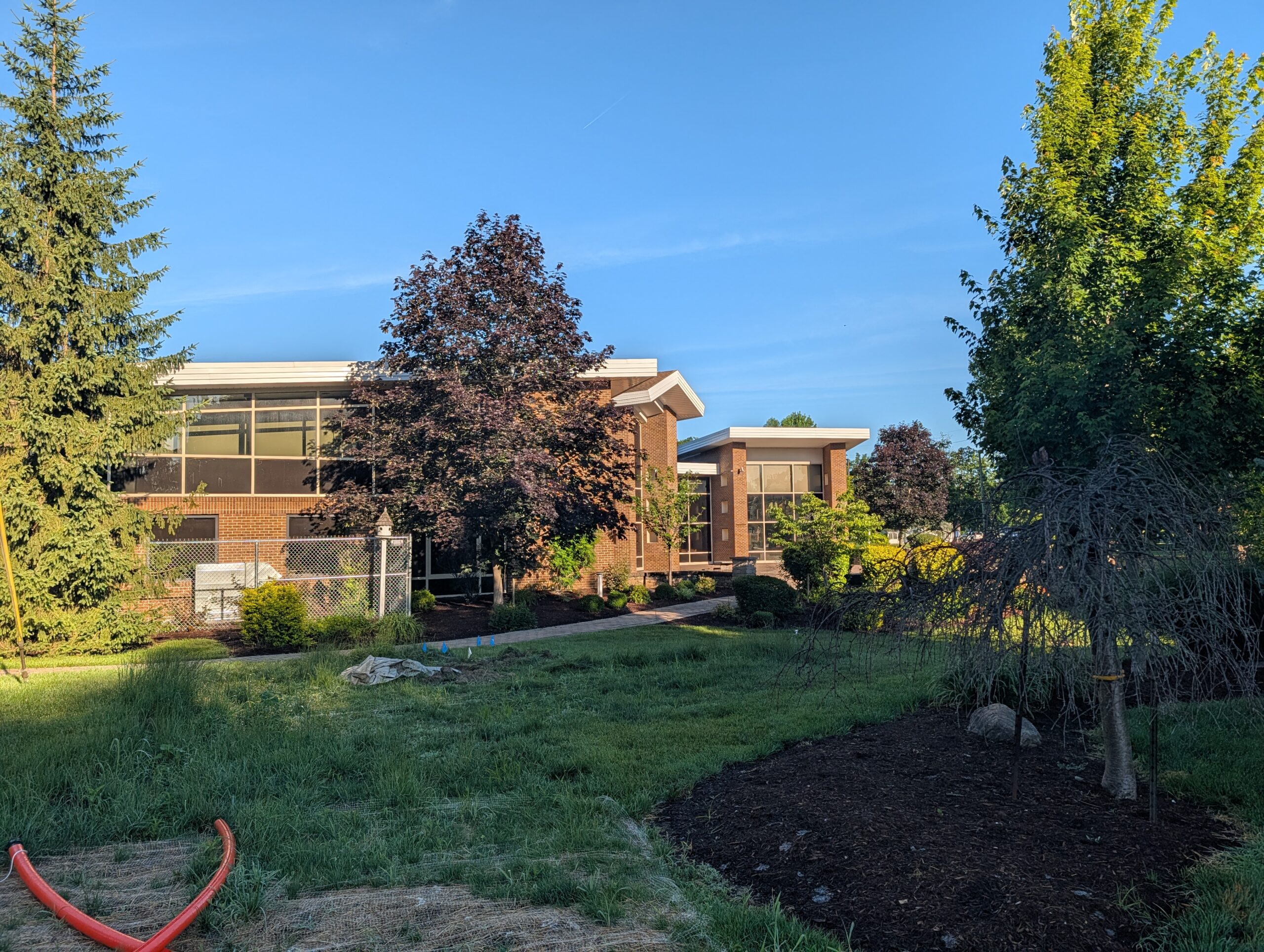 Modern Office Building Landscaping Sunny Day Mooresville Public Library - Exterior Cleaning