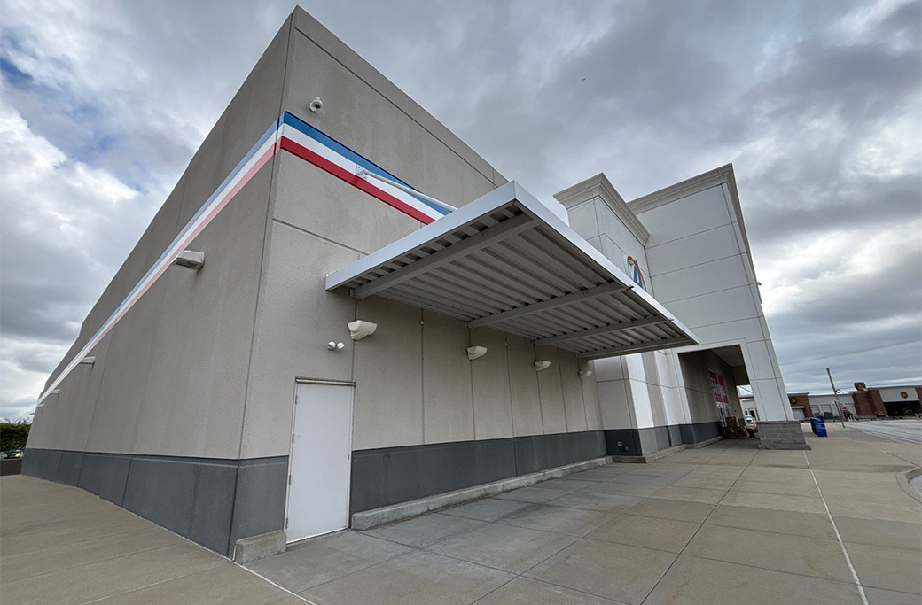 Commercial building exterior exposed to Indiana weather conditions requiring protective paint maintenance