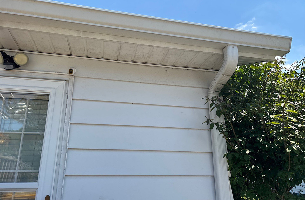 Different exterior siding materials requiring professional painting preparation