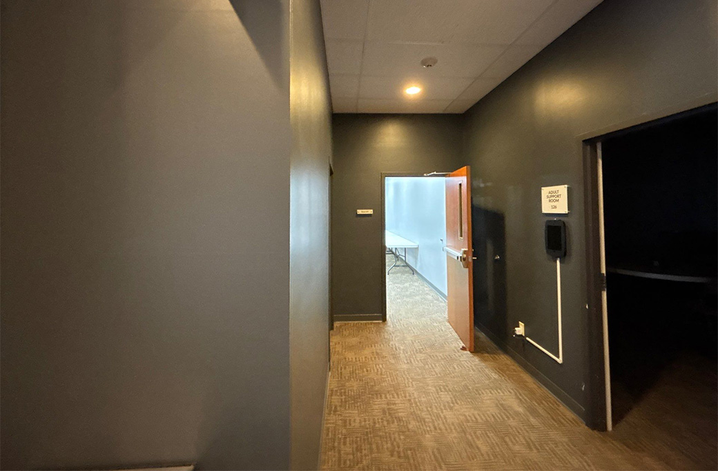 Painted commercial hallway showing phased access within a Central Indiana facility